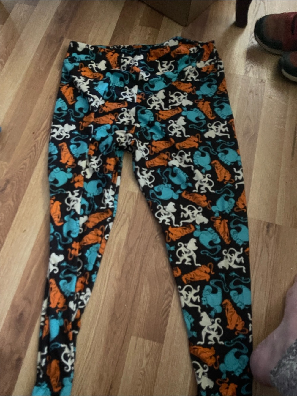 LuLaRoe Black Leggings with Orange, Teal & Cream Animal Print